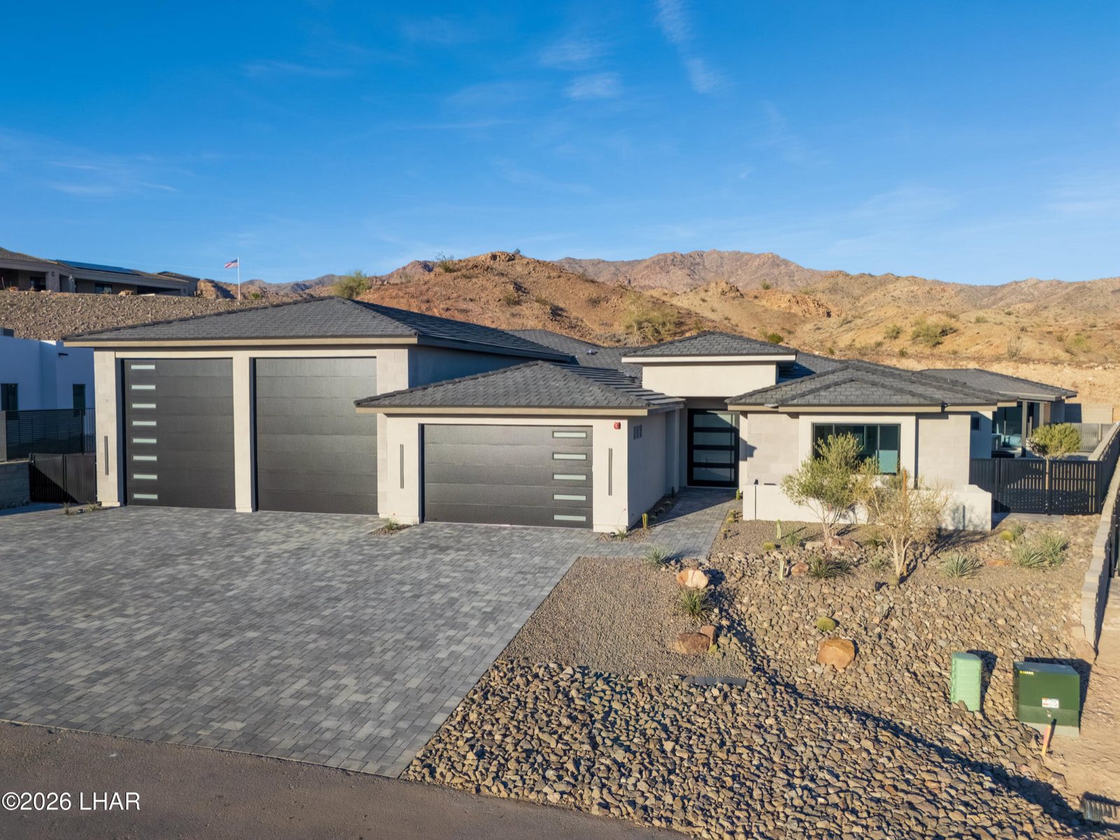 Aerial view of a new Moran AZ Homes build against the Havasu Foothills