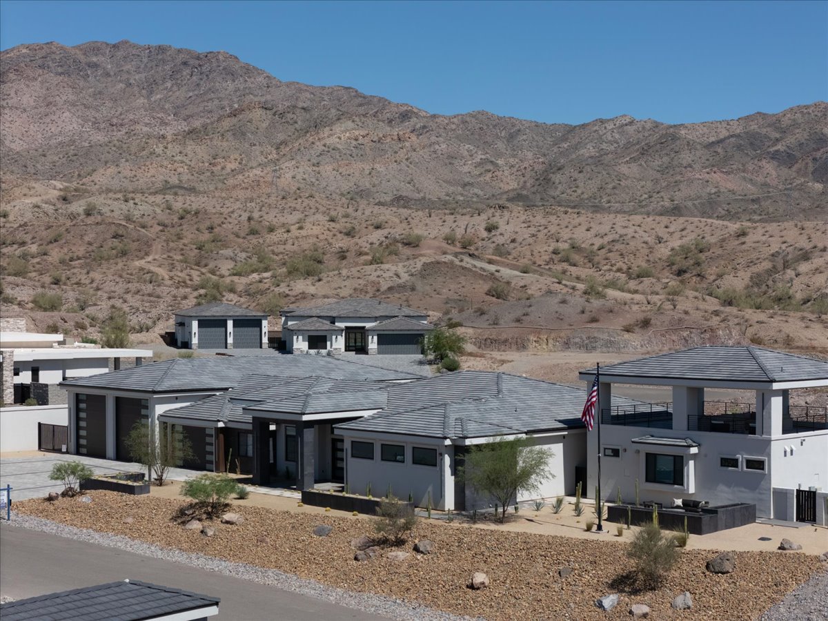 Aerial exterior view of 6269 Avienda De Las Colinas against the Havasu Foothills
