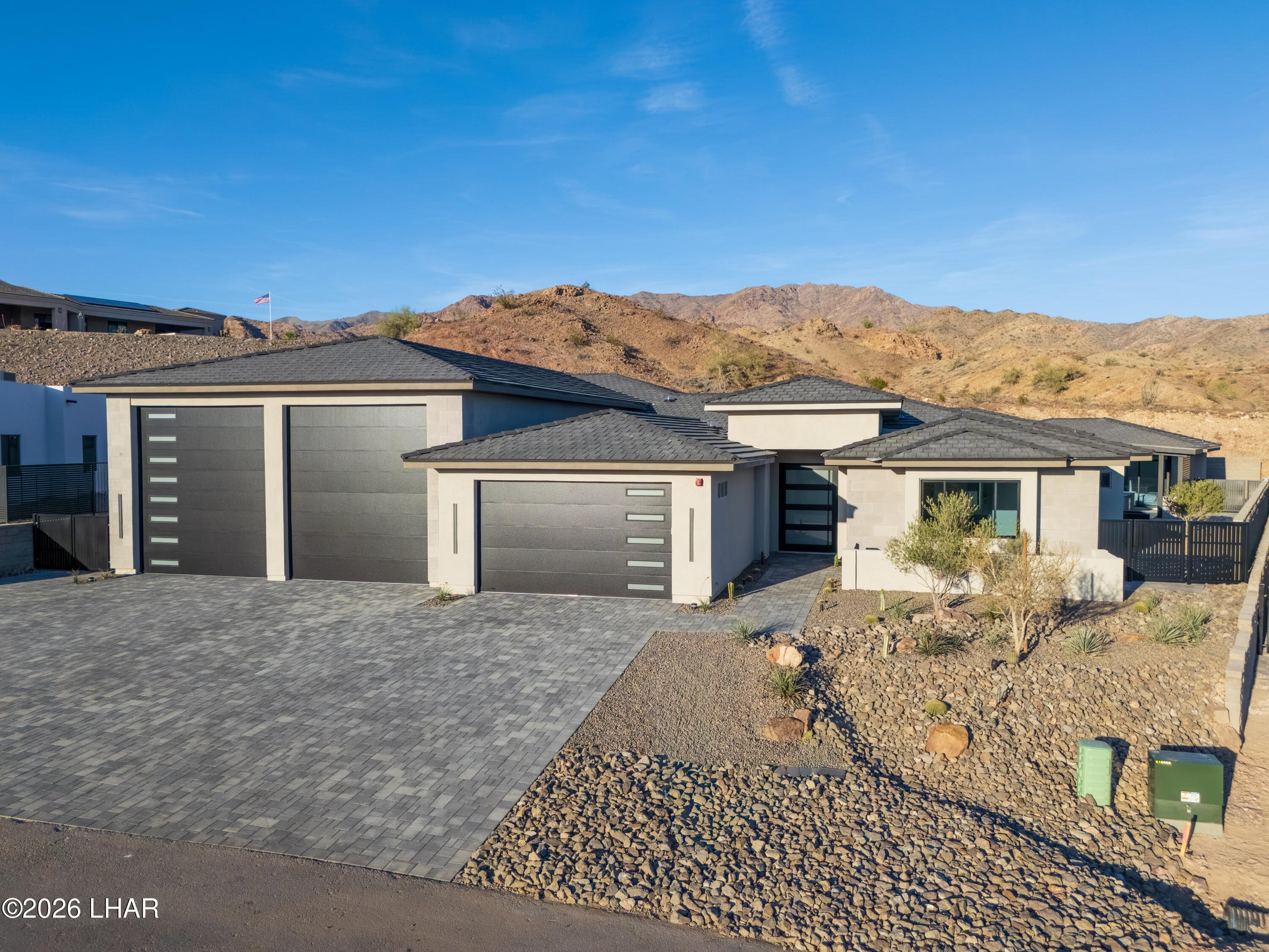 Aerial exterior view of 6295 Avienda De Las Colinas against the Havasu Foothills