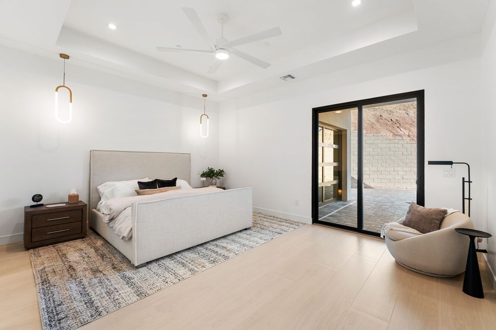 Primary bedroom with a sliding door to the patio