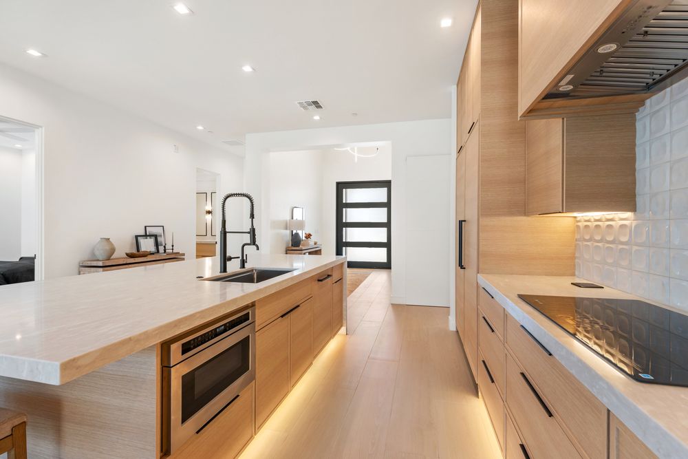 Kitchen island sink and cooktop