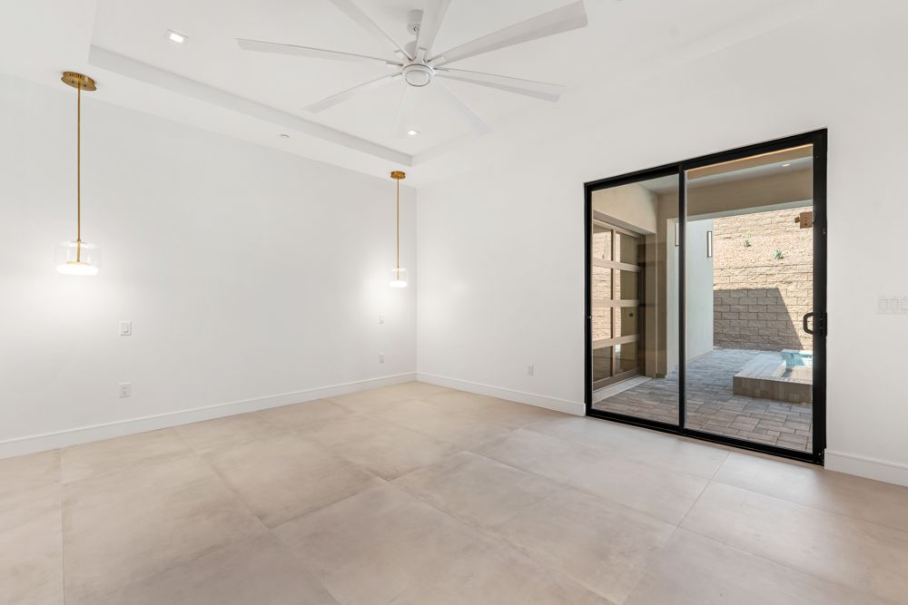 Primary bedroom with a sliding door to the patio