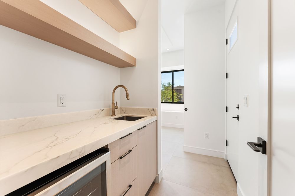 Wet bar with wine refrigerator