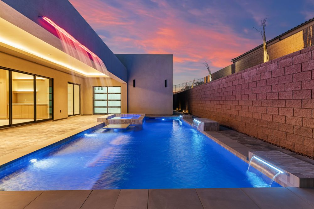 Pool lit blue at twilight